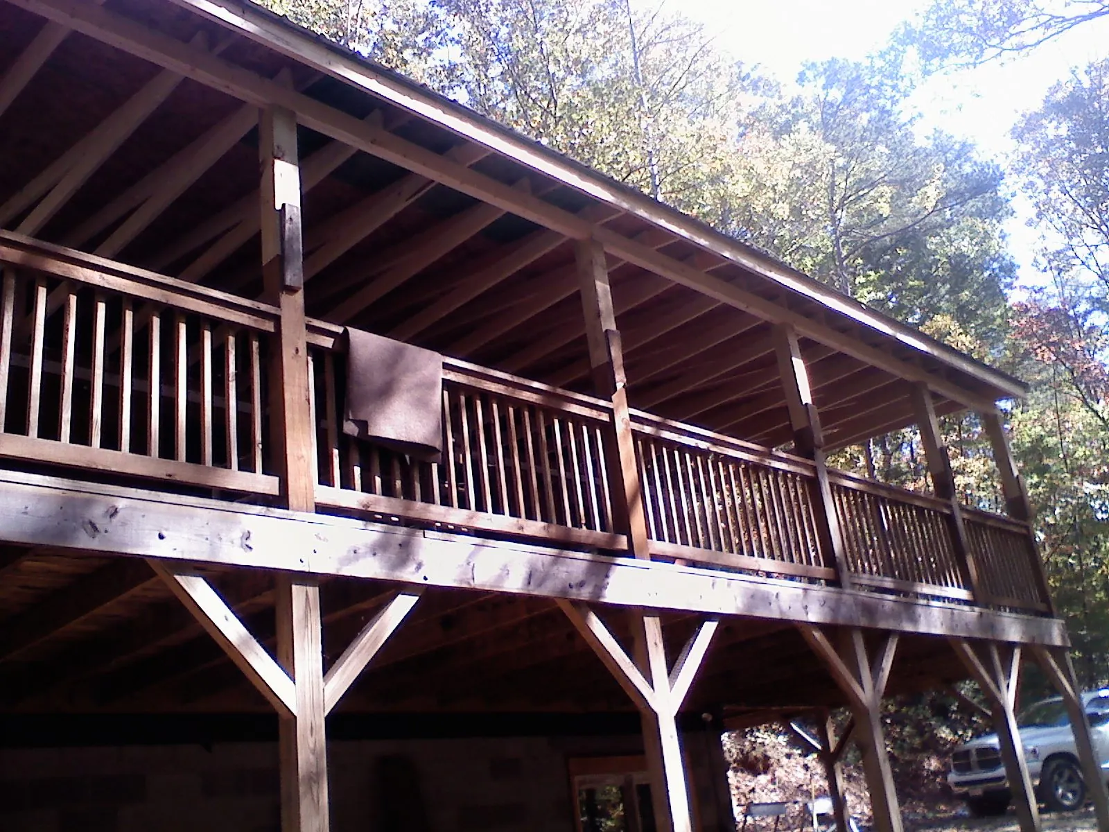 Timber framing under a new elevated porch and deck — Roof Leak Repair in Hartville by Roofing Brothers